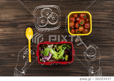Top view of a person eating fresh vegetables Top view of a person eating fresh vegetables 30203437