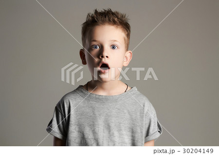 funny kid.surprised little boy. 30204149