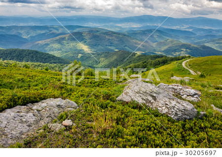 huge rocks in valley on top of mountain ridge huge rocks in valley on top of mountain ridge 30205697