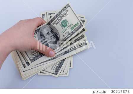 Human hand holding American dollar banknotes  30217878