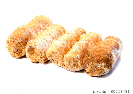 Rolls with cream on a white background. 30218451