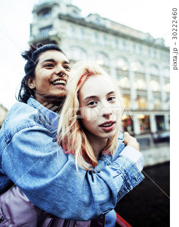 Two teenage girls infront of university building Two teenage girls infront of university building 30222460