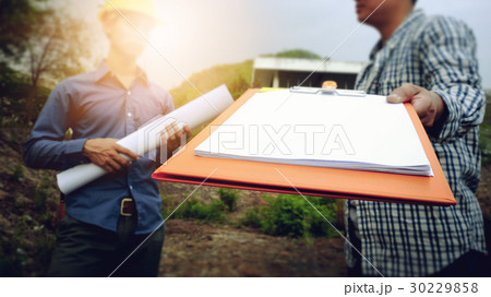 Thai engineer working outdoor teamwork, hipster. 30229858