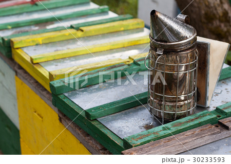 bee smoker on top of beehives boxes bee smoker on top of beehives boxes 30233593