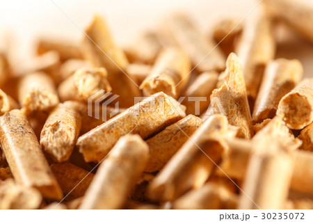 Wooden pellets on paper Wooden pellets on paper 30235072