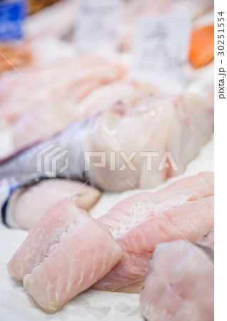 Fresh monkfish fillet on ice for sale at market Fresh monkfish fillet on ice for sale at market 30251554