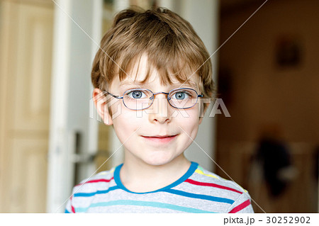 Portrait of little cute school kid boy with Portrait of little cute school kid boy with 30252902