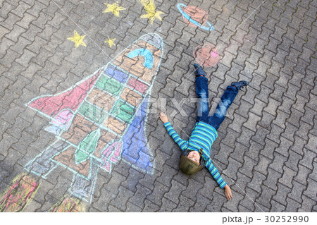 little kid boy flying by a space shuttle chalks little kid boy flying by a space shuttle chalks 30252990
