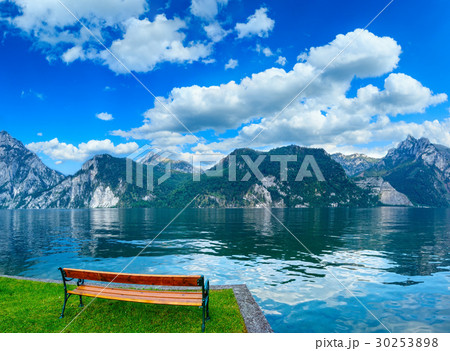 Banch near alpine summer lake 30253898