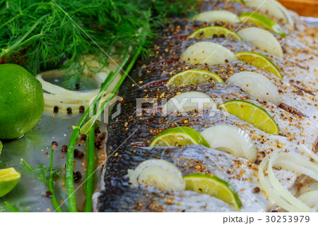 Delicious marinated fish with lemon and onion Delicious marinated fish with lemon and onion 30253979