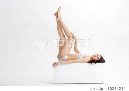 young beautiful brunette woman with long slender young beautiful brunette woman with long slender 30254234