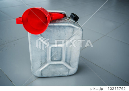 Gasoline canister with red funnel Gasoline canister with red funnel 30255762