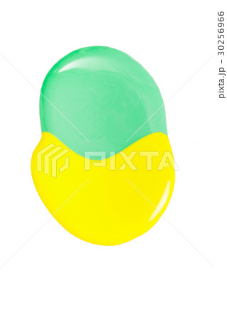 Blot of yellow and green nail polish isolated on Blot of yellow and green nail polish isolated on 30256966