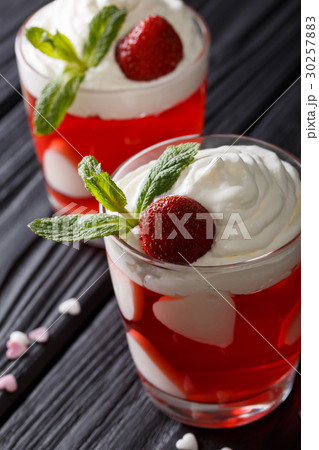 Strawberry dessert with whipped cream 30257883