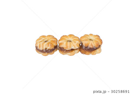 biscuits, filled with pineapple jam isolated biscuits, filled with pineapple jam isolated 30258691