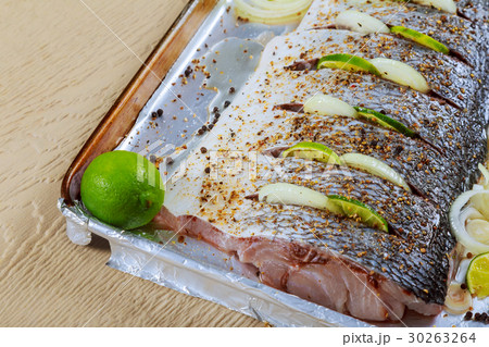 Marinated fried fish fry with spices lemon filets Marinated fried fish fry with spices lemon filets 30263264