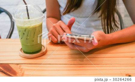 Young woman and smartphones Young woman and smartphones 30264266