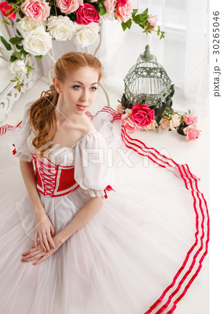 Cute ballerina and bouquets of flowers 30265046