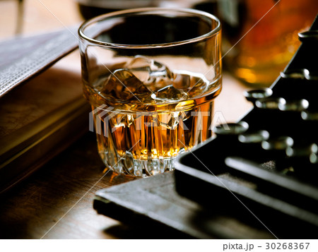 Writer's night with a glass of whiskey Writer's night with a glass of whiskey 30268367