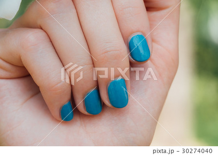 White plumeria Flower on hand With a turquoise 30274040