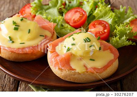 Eggs Benedict with salmon and hollandaise sauce 30276207