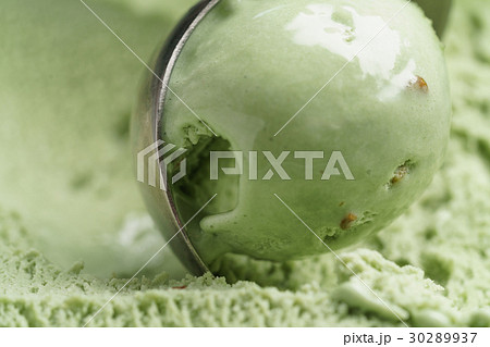 scooping natural pistachio ice cream closeup 30289937
