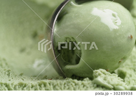 scooping natural pistachio ice cream closeup 30289938
