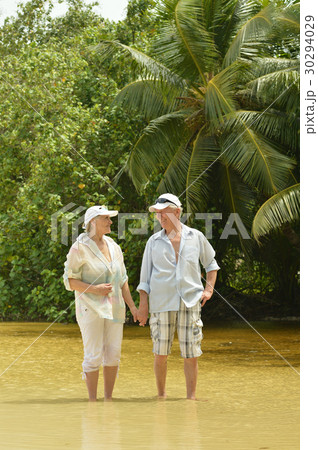 Elderly couple rest at tropical resort 30294029