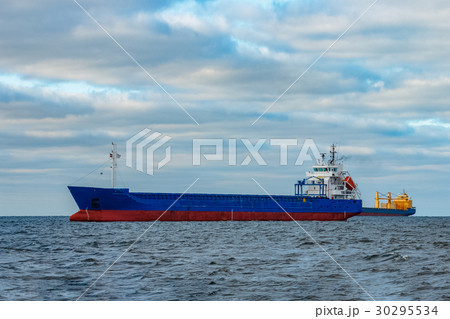 Blue cargo ships moored Blue cargo ships moored 30295534