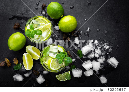 Refreshing mint cocktail mojito with rum and lime Refreshing mint cocktail mojito with rum and lime 30295657