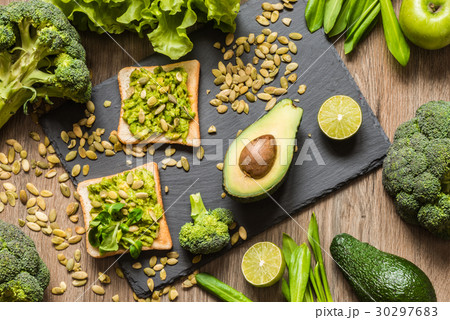 Healthy green food. Vegan sandwiches with avocado 30297683