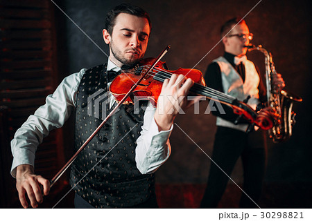 Jazz man and violinst, classical musical duet Jazz man and violinst, classical musical duet 30298821
