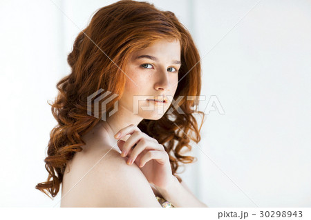 Beautiful young redhead woman Beautiful young redhead woman 30298943
