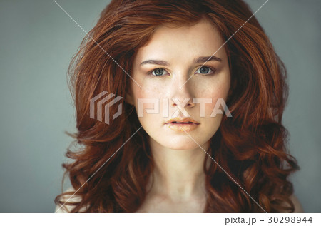 Beautiful young redhead woman with freckles portra Beautiful young redhead woman with freckles portra 30298944