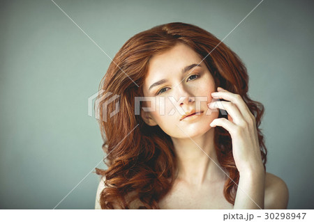 Beautiful young redhead woman Beautiful young redhead woman 30298947