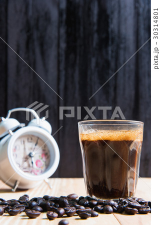 espresso in a glass on wooden table espresso in a glass on wooden table 30314801