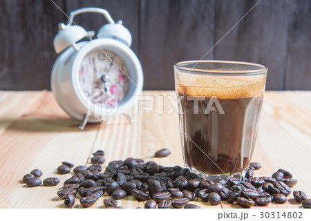 espresso in a glass on wooden table espresso in a glass on wooden table 30314802