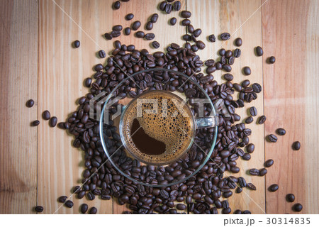 espresso in a glass on wooden table 30314835