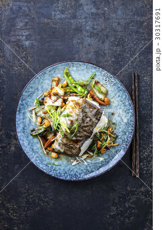 Halibut Filet with Thai Vegetable on Plate 30317691