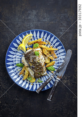 Halibut Filet with Fried Potatoes 30317692
