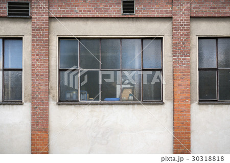 old window of a work shop for backgrounds 30318818