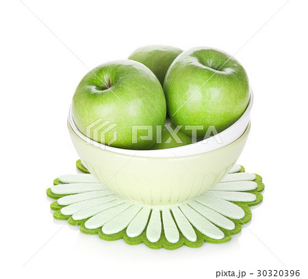 Green apples in fruit bowl 30320396