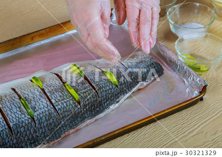 marinated fish with lemon and onion dish the oven marinated fish with lemon and onion dish the oven 30321329
