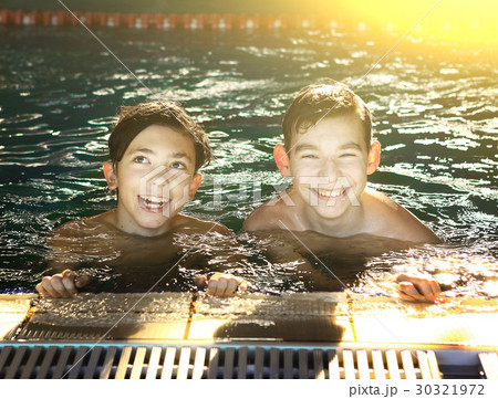 teenager boys in open air swimming pool 30321972