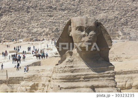 Closeup view of the Sphinx head with pyramid, Giza Closeup view of the Sphinx head with pyramid, Giza 30323235