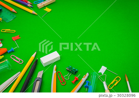 School supplies on Green chalkboard " Back to school background " . School supplies on Green chalkboard " Back to school background " . 30328096