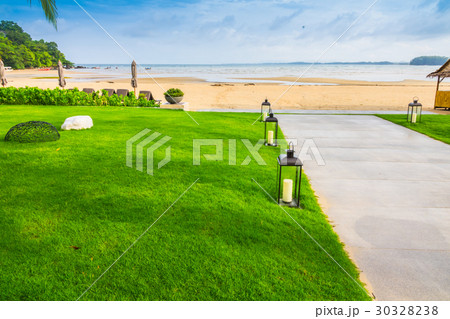 Beach and tropical sea . Beach and tropical sea . 30328238