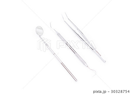 Dental tools and equipment on white background Dental tools and equipment on white background 30328754
