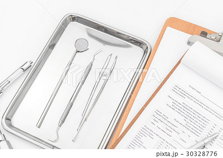 Dental tools, equipment and dental chart on white background 30328776