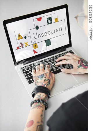 Hands working on laptop network graphic overlay 30332259